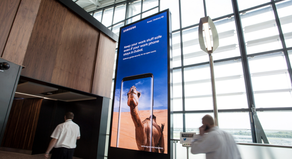 Tall digital tower in a premium terminal atrium